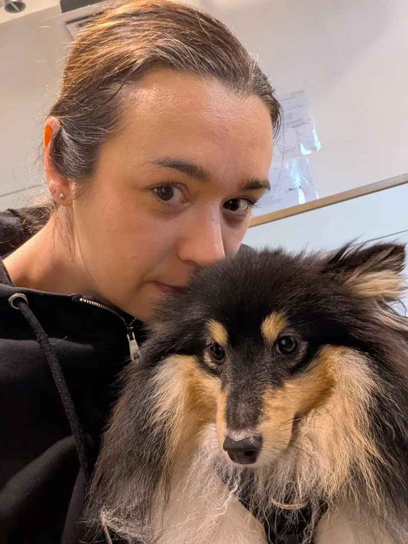 Lauren, Registered Veterinary Nurse at The Veterinary Wellness Centre, with a Shetland Sheepdog